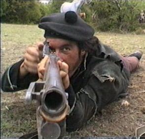 Actor Michael Mears aiming a replica Baker Rifle at Jason Salkey (with camera). Image from the video by Jason Salkey.