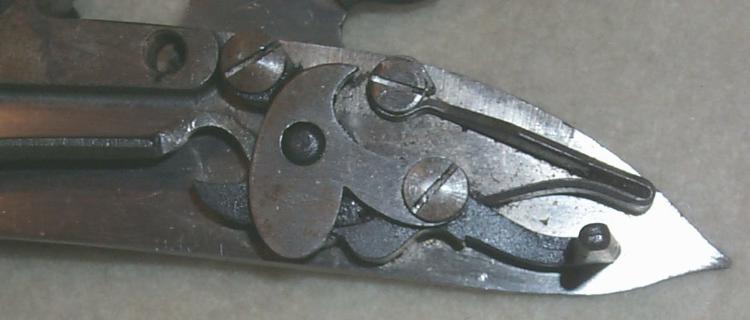 Close up of the mainspring, tumbler, sear and bridle of a replica Brown Bess musket. Image courtesy of Dan.